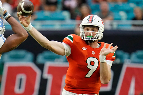 A University of Miami student athlete football player makes a catch. 