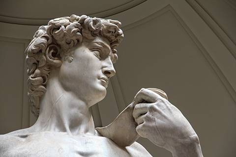 A close-up shot of the David in Florence, Italy. 